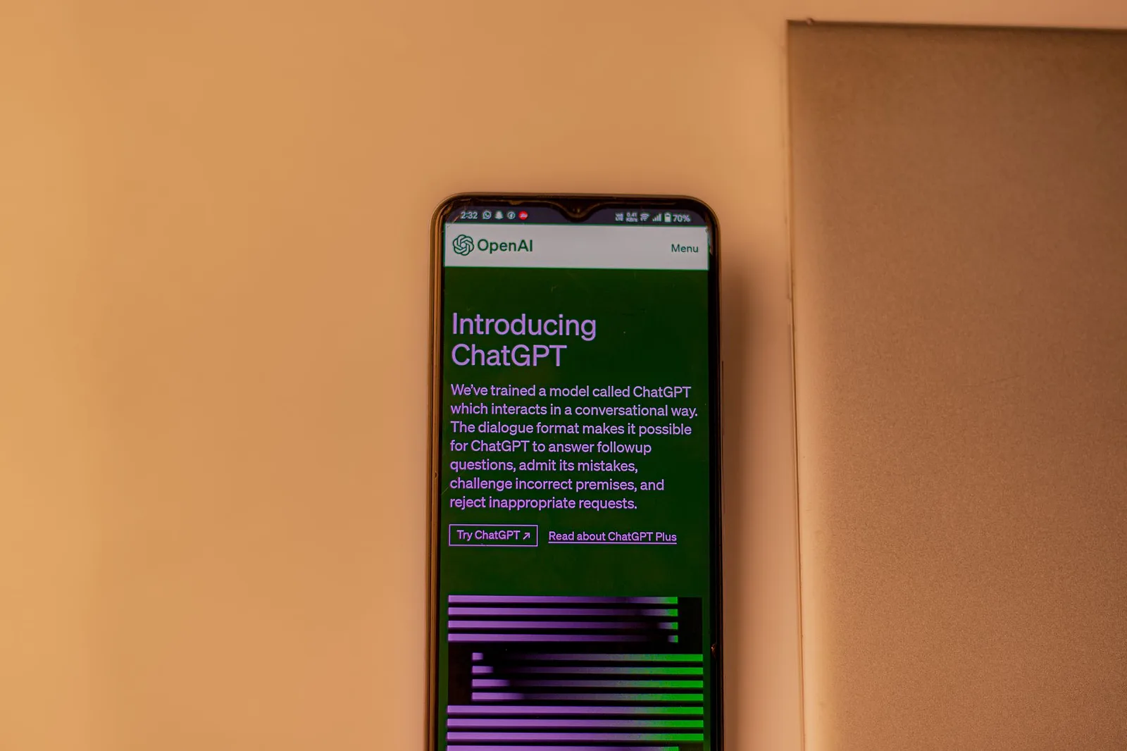 Smartphone displaying an OpenAI ChatGPT introduction page